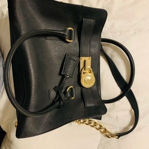 Black and gold Michael Kors bag